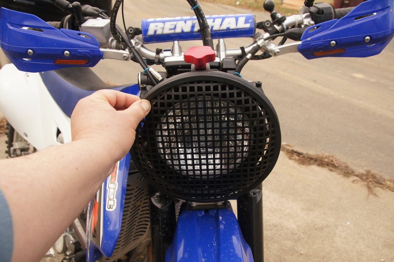 Headlight protector/grille for the Trailtech 7" Baja Light DRZ400/E/S