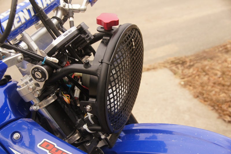 Headlight protector/grille for the Trailtech 7" Baja Light DRZ400/E/S
