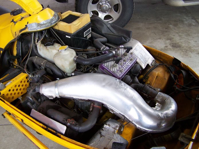 Adjustable length expansion chamber Motorcycle Engineering