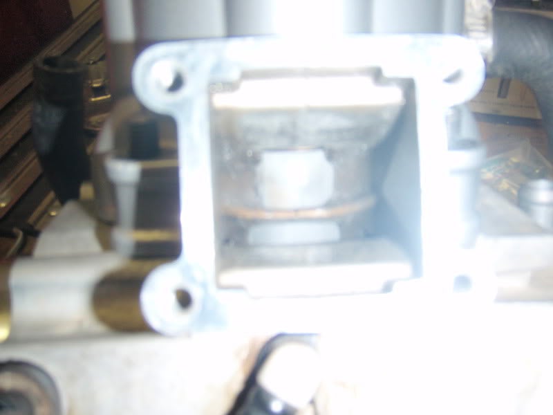 calling all 2 stroke know it all's. (intake window in piston